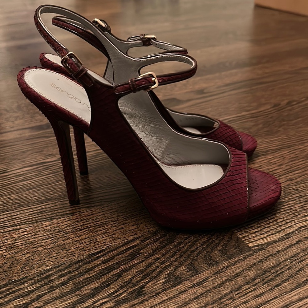 Burgundy Sergio Rossi heels in a 40, is comparable to a size 9 US.